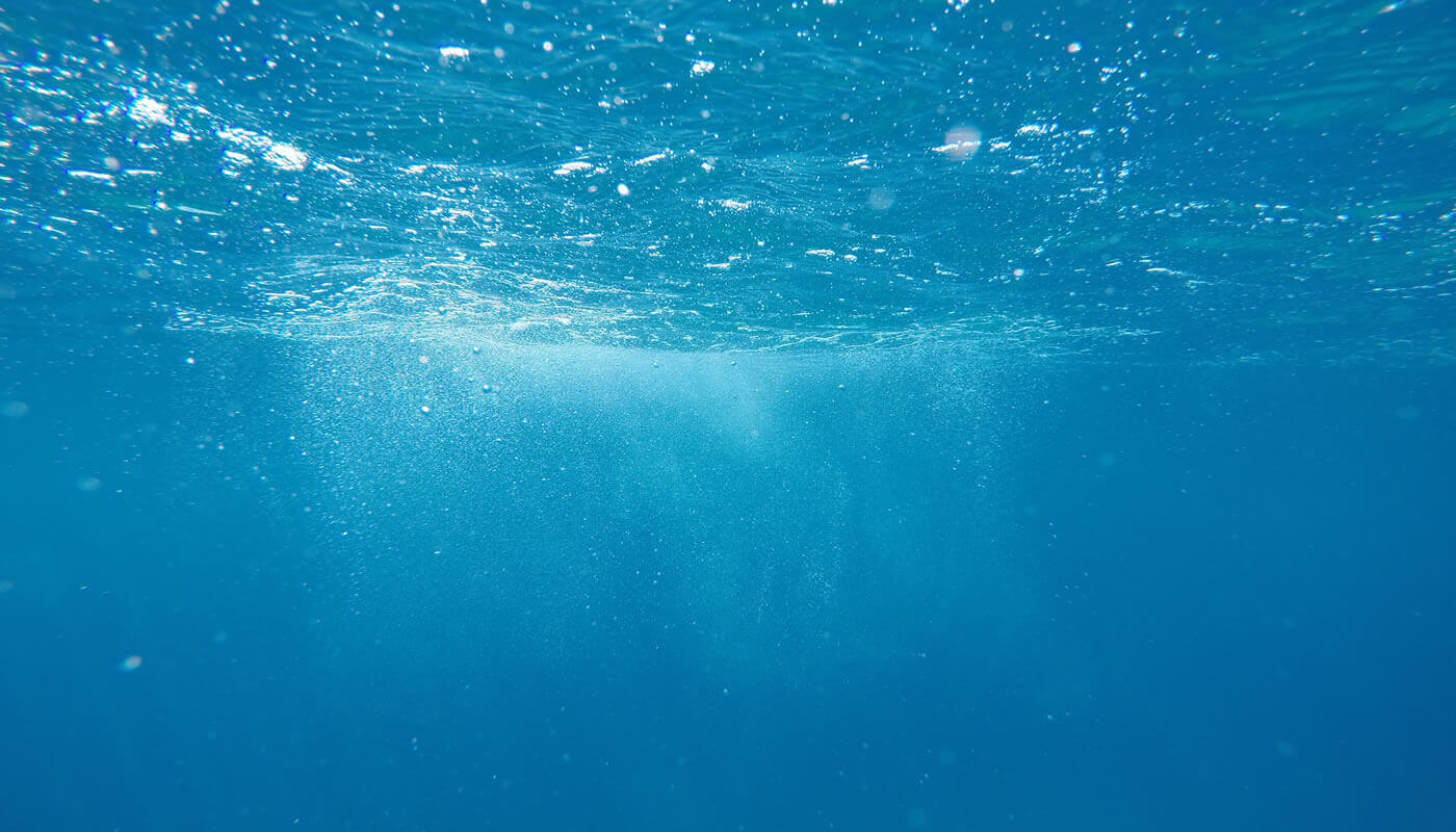 Scuba in a Light Blue Sea